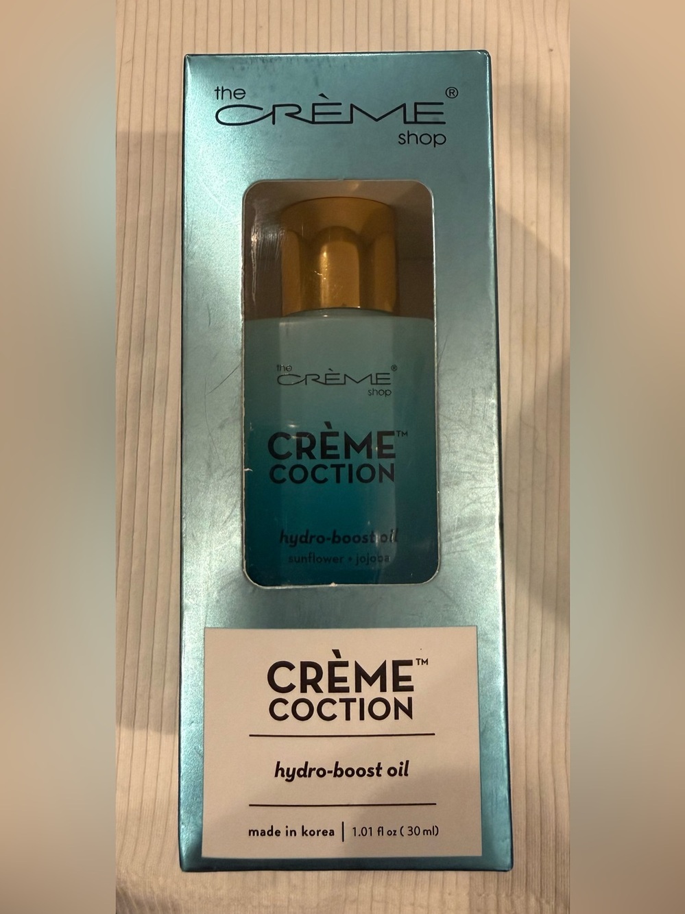 The Crème Shop Crème Coction Hydro-Boost Oil — Blue/Gold